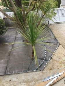 Pose de géotextile pour aménagement de jardin Rots